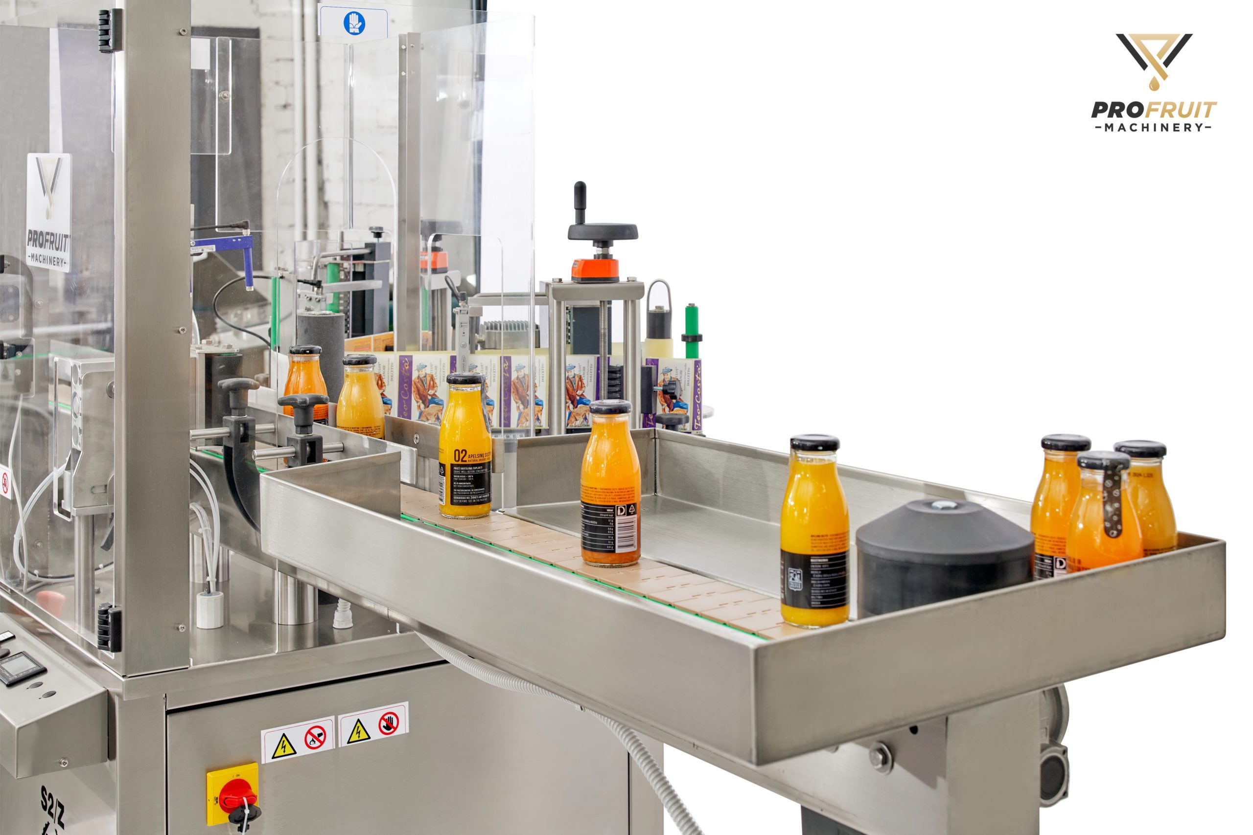 Semi-automatic bottle labeling machine from up close | ProFruit Machinery